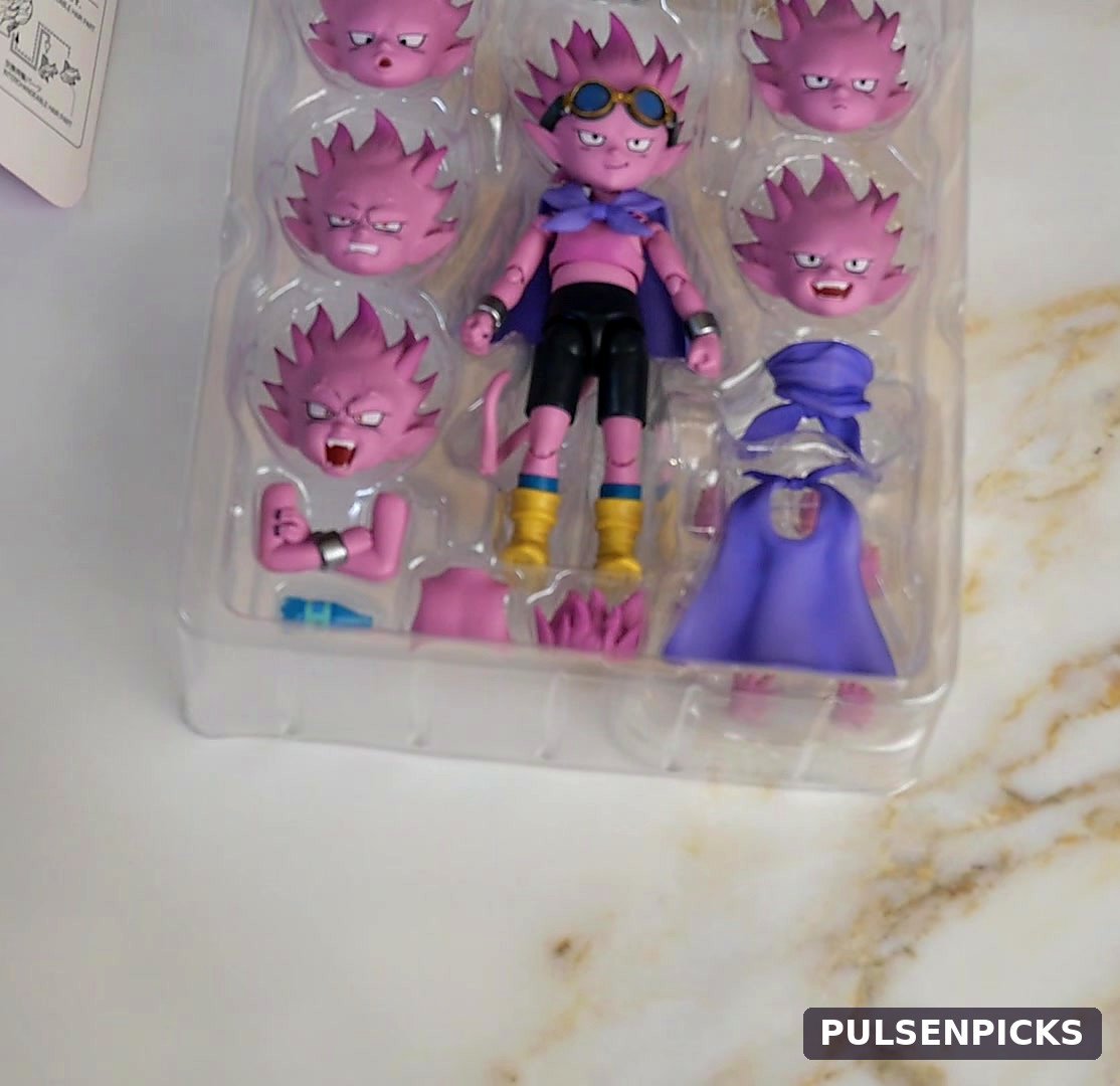 Beelzebub action figure and accessories inside the tray