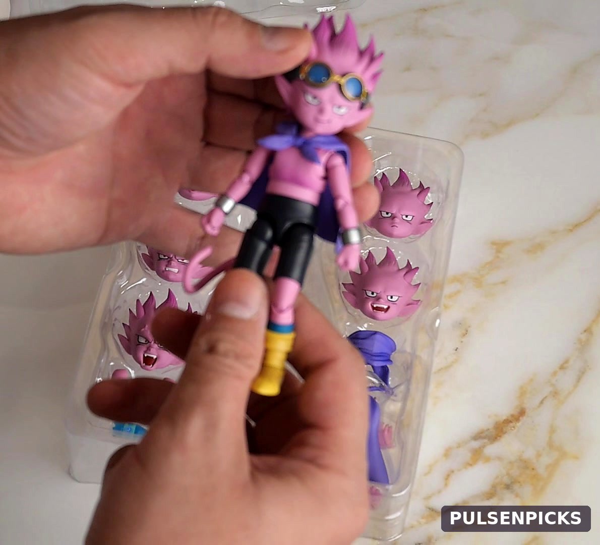 Close-up photo of S.H.Figuarts Beelzebub Sand Land figure held in hand