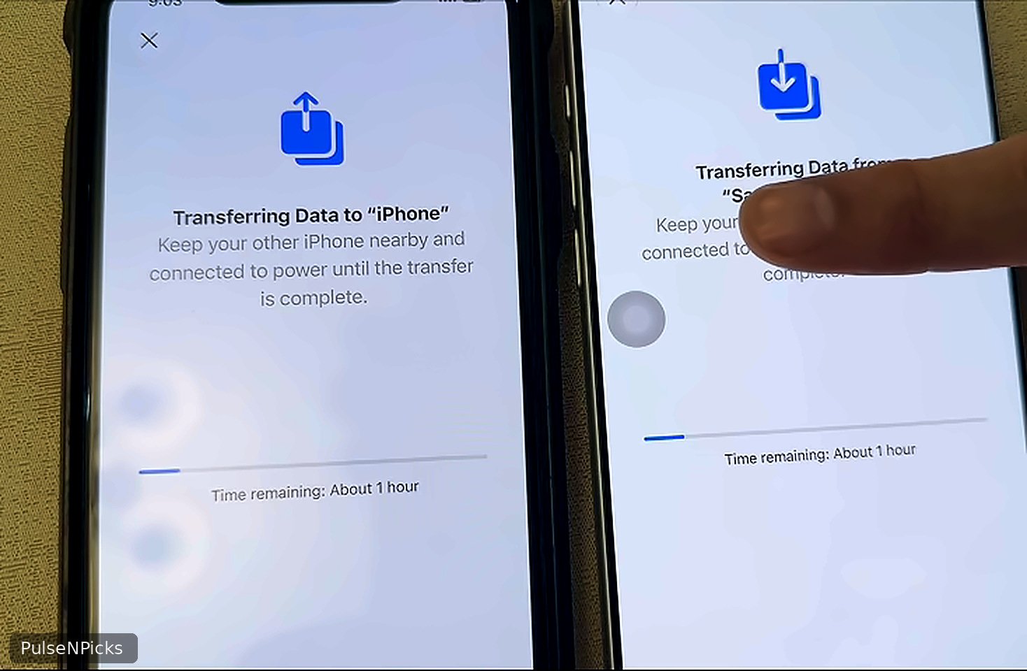 Two iPhones showing direct data transfer progress