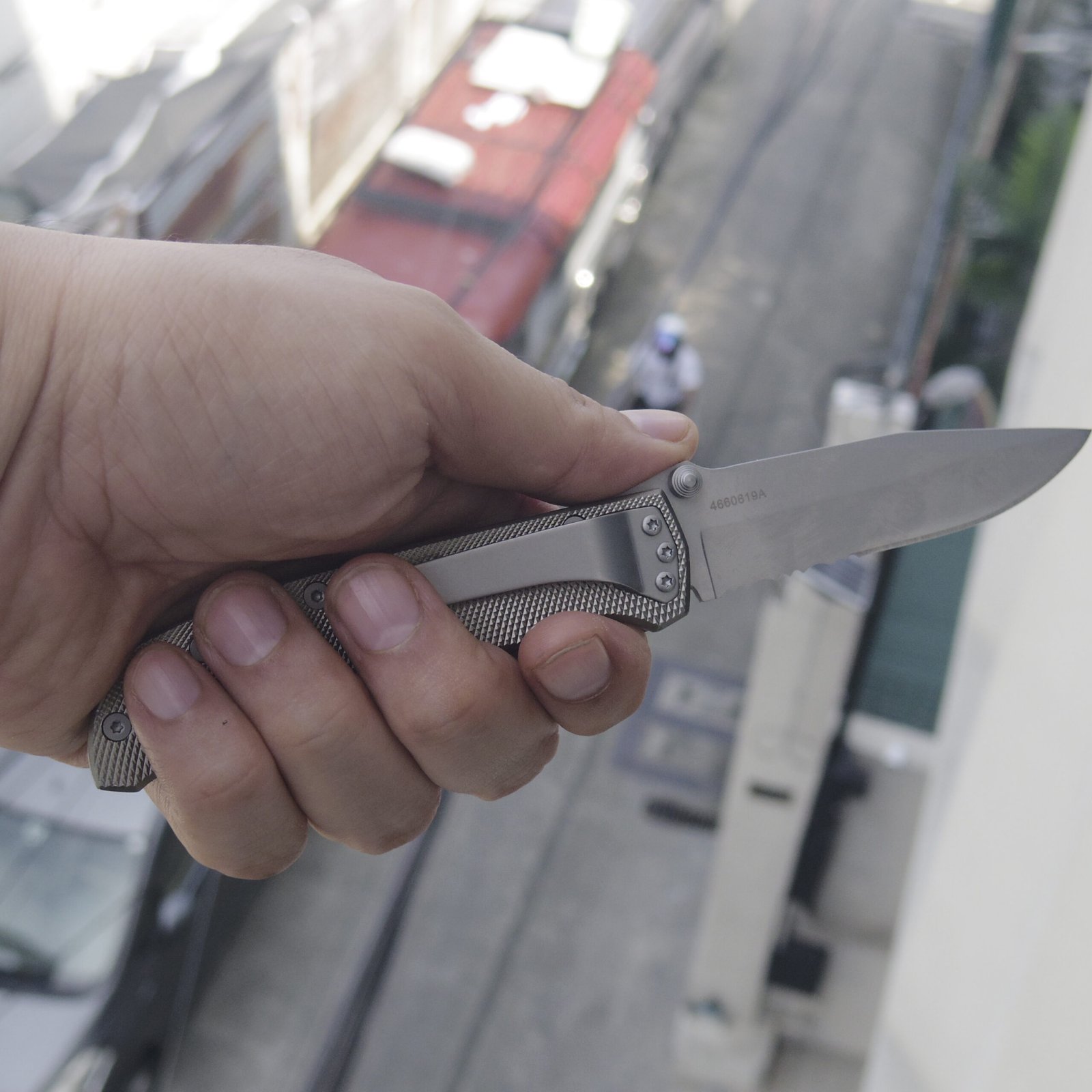 Gerber Air Ranger partially serrated blade and crosshatched aluminum handle shown in open position