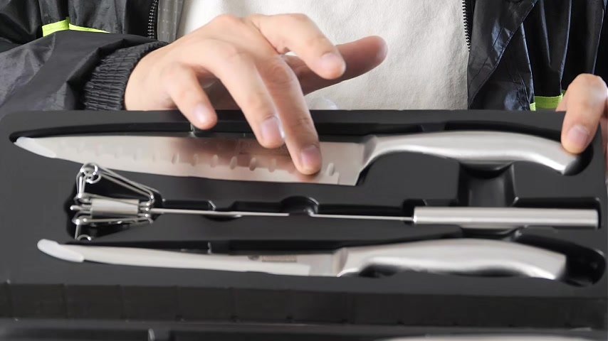 Video frame showing Hessler Gourmet knives in their tray