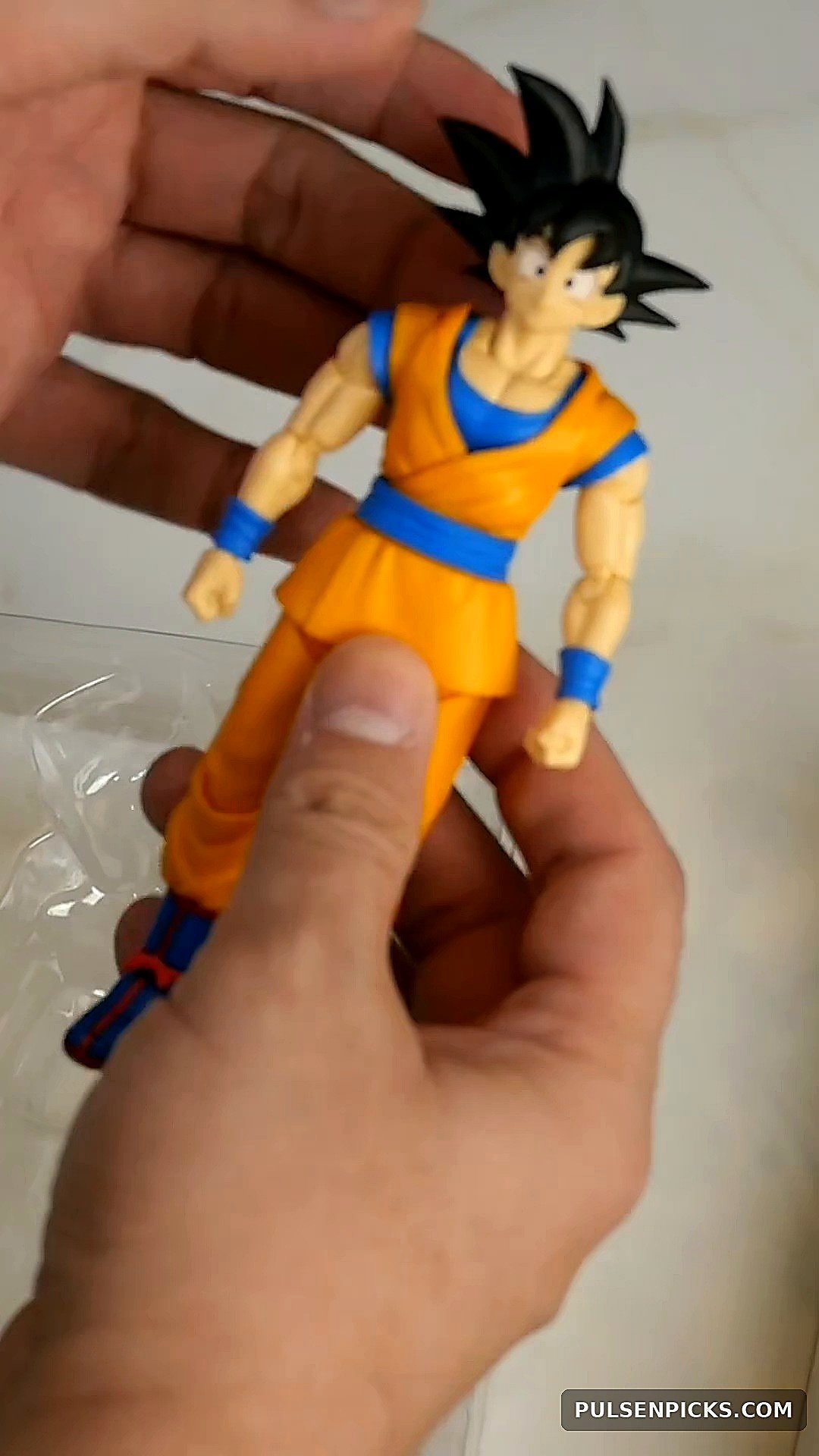 Goku DAIMA front view showing orange gi without a master emblem