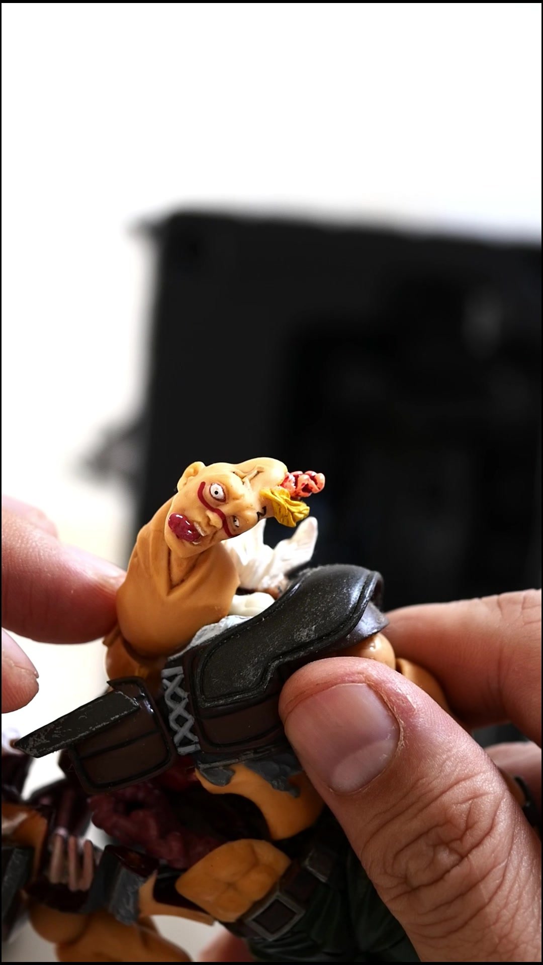 Rotating the Zeed Gang figure's damaged face
